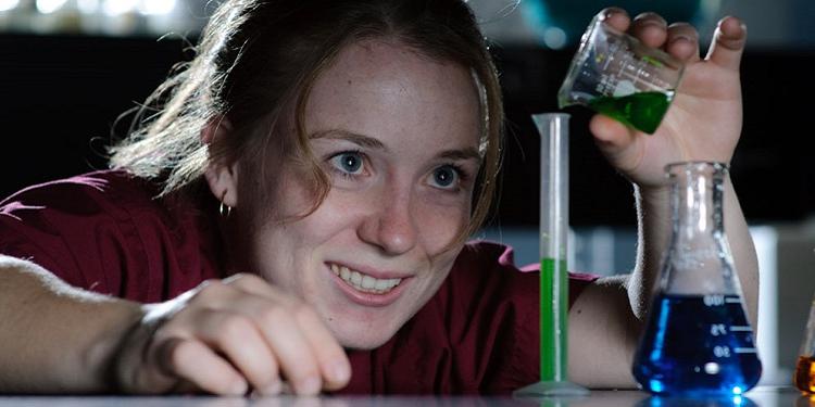 Woman doing an experiment 750x375